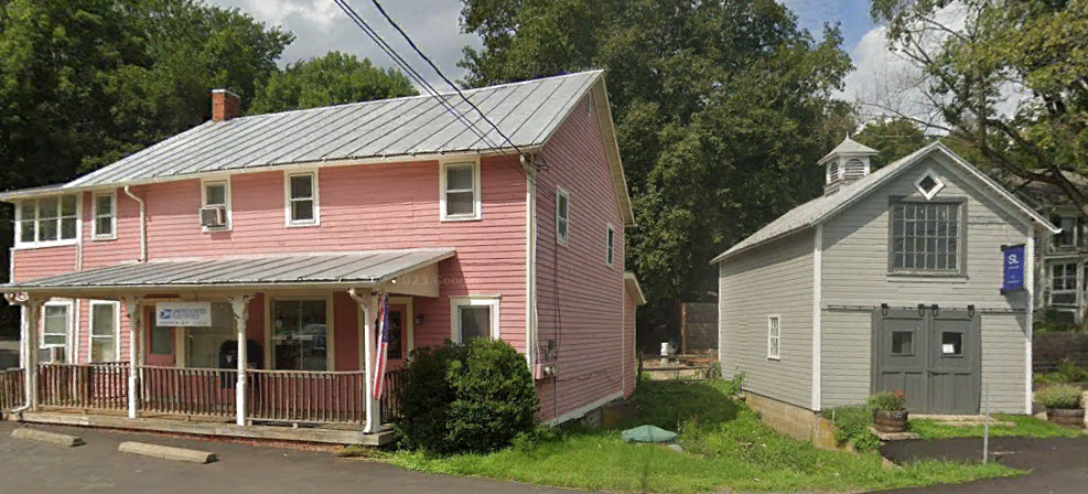 Street view showing the Ancram Post Office (pink building, left) and neighboring barn (gray, right)